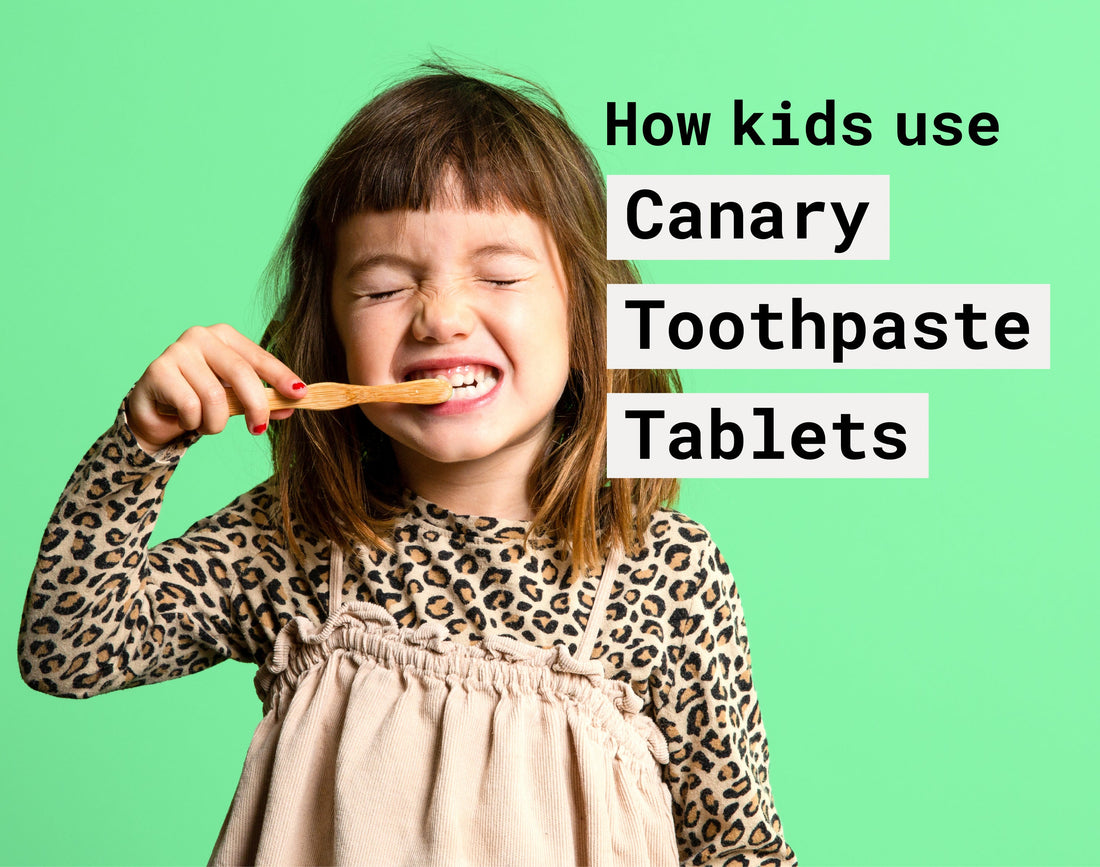 Image of young girl brushing with Canary toothpaste tablets for kids