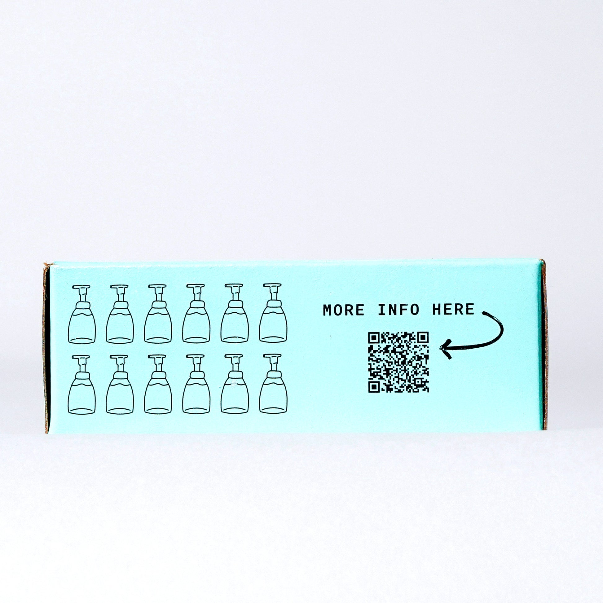 Fir Needle & Sage Concentrated Foaming Hand Soap. Side of the box showing 12 bottles and QR code. 12-count box. 