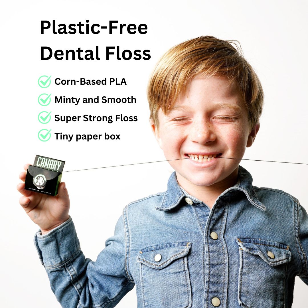 Photo of child using Canary plastic free dental floss, made out of corn-based PLA and is minty, smooth and super strong. Comes in a tiny paper box, great for traveling